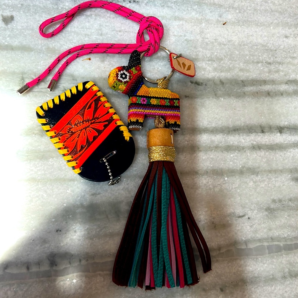 Brand new Consuela Purse Charm snd Luggage Tag.